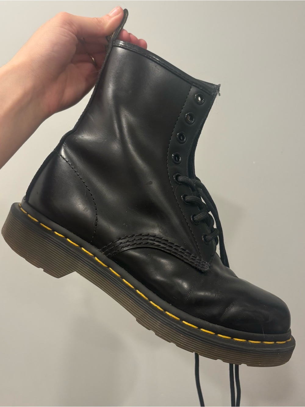 Dr. Martens Black Leather Combat Boots with Yellow Stitching